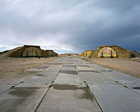 Aircraft shelters alongside the runway