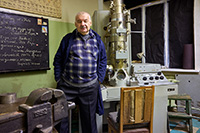 Portrait of physicist with electronic microscope